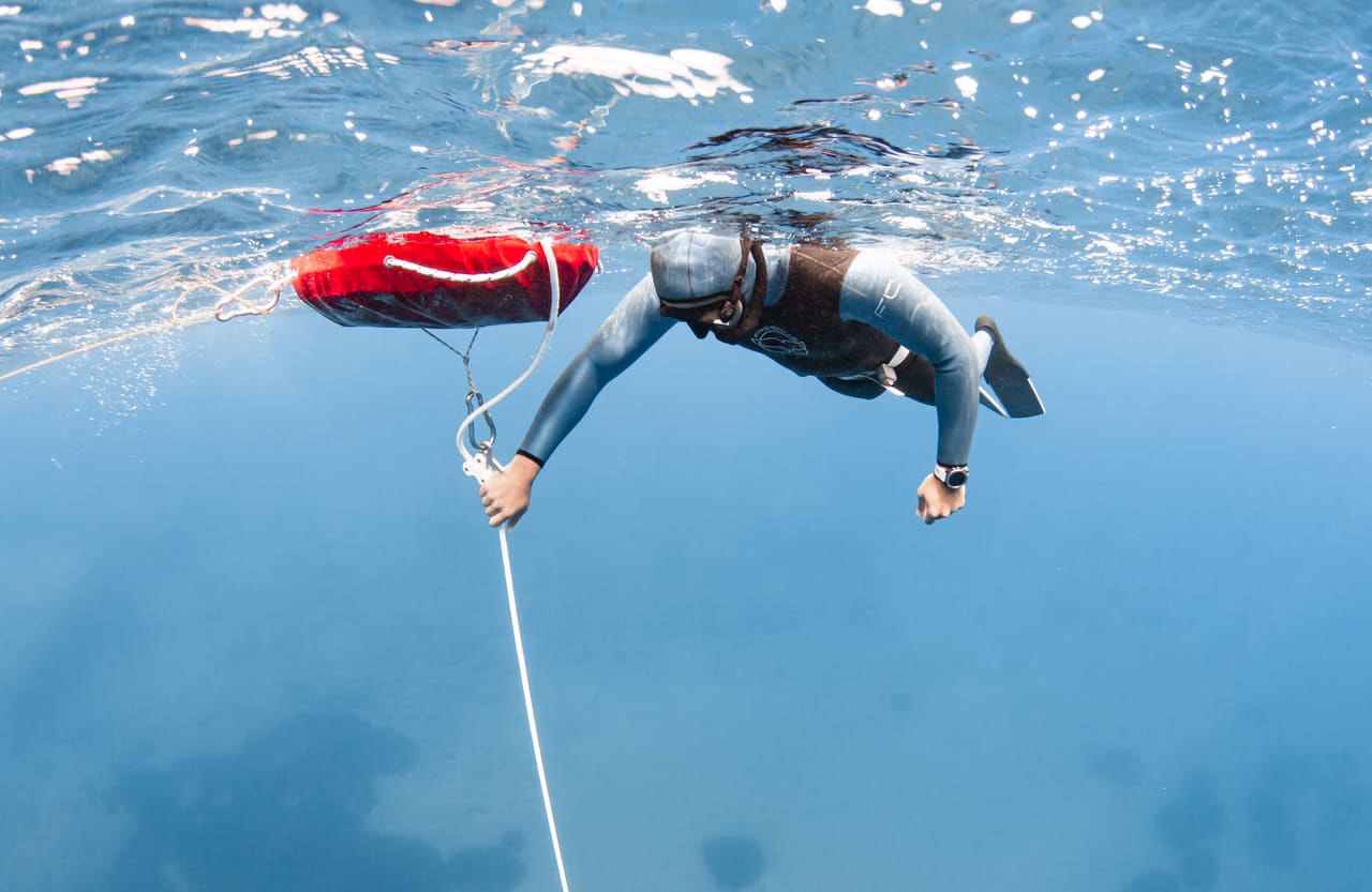 Experienced freediver training on a line in Crete