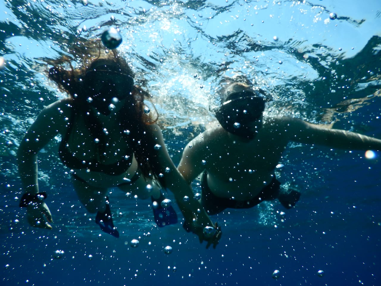 Non-divers on the boat while others dive